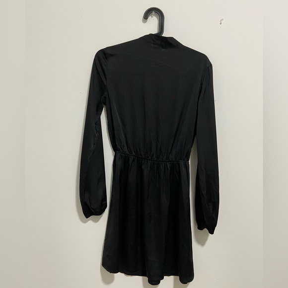 Black flowy dress with a deep neck and tie from H & M in size UK 8 - Picture 3 of 5